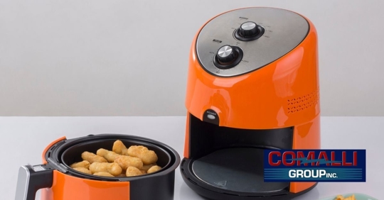 An air fryer on a kitchen countertop.